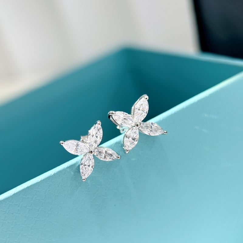T*f*ny earrings